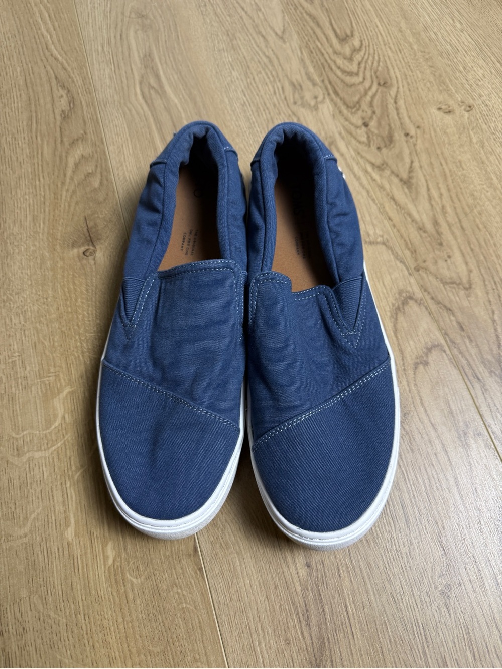 Toms women’s blue slip on canvas sneakers size 11